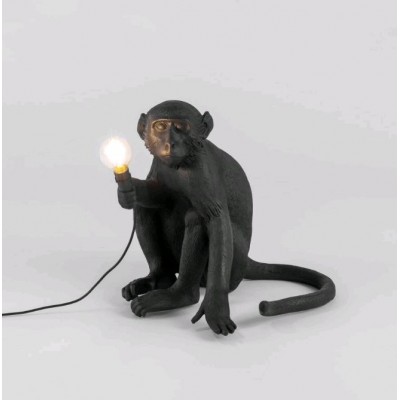 LAMPE SINGE EN RESINE POSITION ASSIE EXT 34X30X32CM